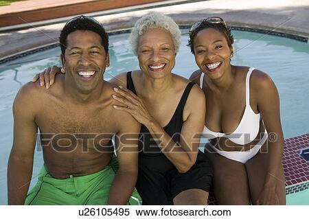 Senior woman with couple at swimming pool, elevated view portrait. View Large Photo Image Stock Photography - Senior woman with couple at swimming pool, elevated view portrait.. Fotosearch