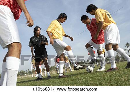 Soccer game, low angle view View Large Photo Image Stock Photo - Soccer game, low angle view. Fotosearch