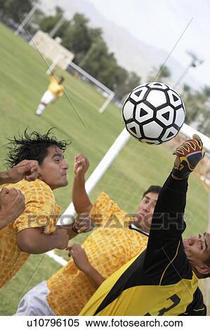 Soccer players competing for ball View Large Photo Image Stock Photography - Soccer players competing for ball. Fotosearch
