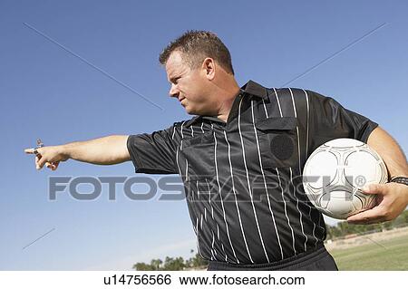 Stock Photograph - Soccer Referee Gesturing. Fotosearch