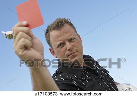 Stock Image - Soccer Referee Showing Red Card. Fotosearch