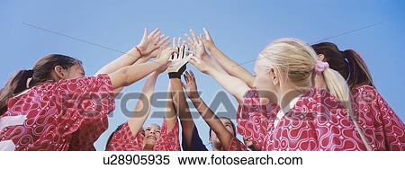 Stock Photography - Soccer Team Giving High Five. Fotosearch