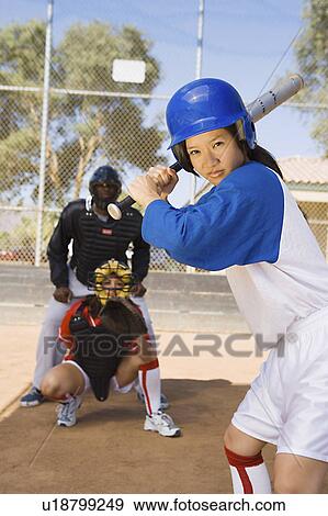 Softball player at bat, portrait View Large Photo Image Stock Photo - Softball player at bat, portrait. Fotosearch