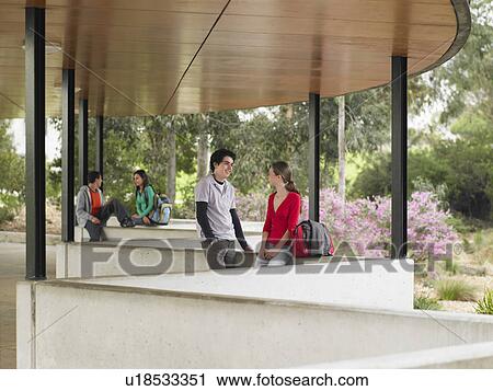 Students talking in outdoor pavilion View Large Photo Image Stock Image - Students talking in outdoor pavilion. Fotosearch