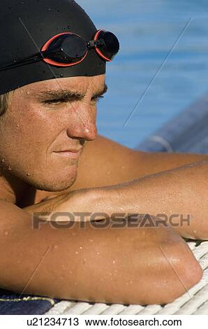 Stock Image - Swimmer at Pool Edge. Fotosearch
