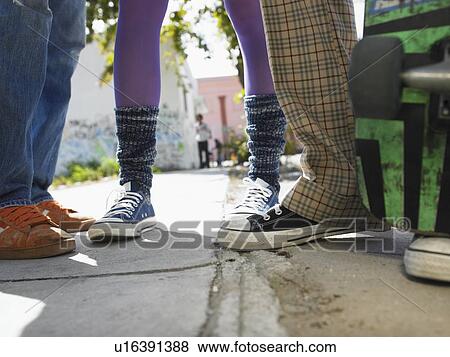Teenage Friends on Sidewalk View Large Photo Image Stock Photo - Teenage Friends on Sidewalk. Fotosearch