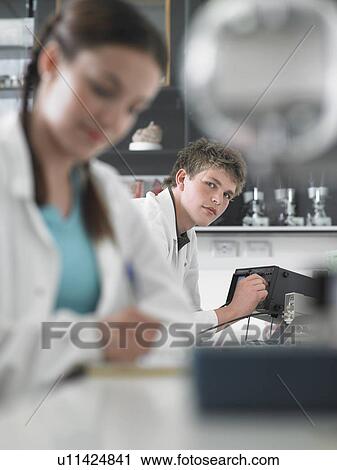 Teenagers working in science class View Large Photo Image Stock Image - Teenagers working in science class. Fotosearch