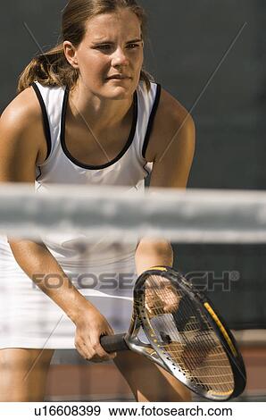 Tennis Player, holding racket, Waiting For Serve View Large Photo Image Stock Photo - Tennis Player, holding racket, Waiting For Serve. Fotosearch