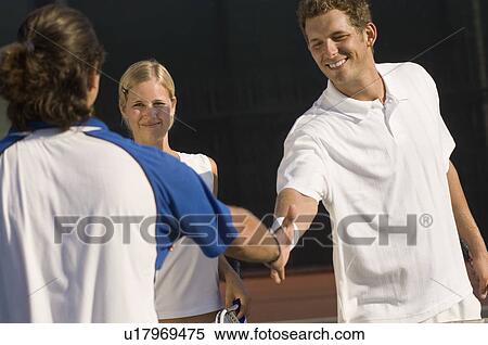 Tennis Players Shaking Hands at Net View Large Photo Image Stock Photography - Tennis Players Shaking Hands at Net. Fotosearch