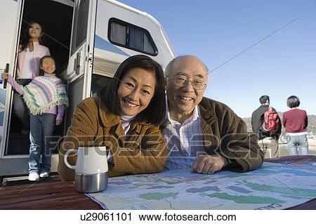 Three-generation family outside of RV View Large Photo Image Stock Image - Three-generation family outside of RV. Fotosearch