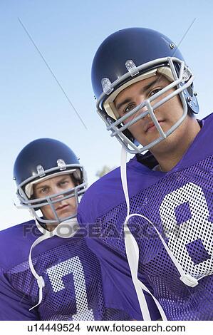 Picture - Two Football Players outdoors, portrait, (portrait). Fotosearch