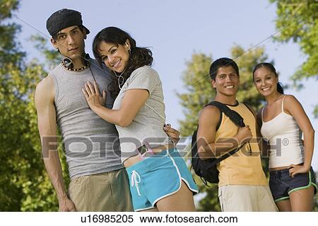 Stock Photography - Two young couples outdoors.. Fotosearch