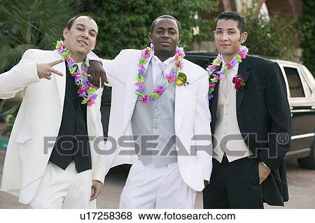 Stock Photo - Well-dressed teenager boys outside, portrait. Fotosearch