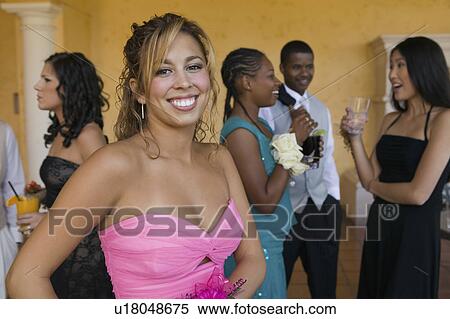 Well-dressed teenagers mingling at school dance View Large Photo Image Stock Photography - Well-dressed teenagers mingling at school dance. Fotosearch