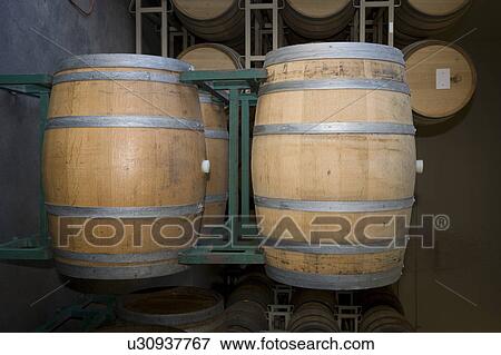 Stock Photo - Wine barrels in winery. Fotosearch