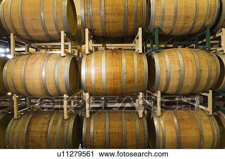 Wine Casks in row and stack View Large Photo Image Stock Image - Wine Casks in row and stack. Fotosearch