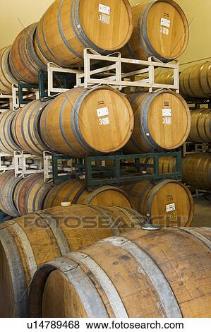 Wine Casks in rows and stacks View Large Photo Image Stock Photo - Wine Casks in rows and stacks. Fotosearch