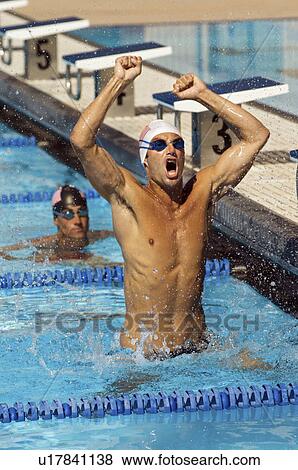 Stock Photo - Winning Swimmer. Fotosearch