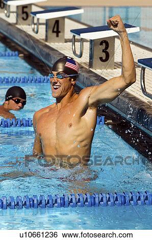 Stock Photograph - Winning Swimmer. Fotosearch