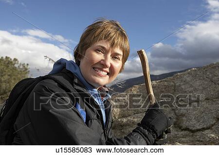 Woman in mountains, (portrait) View Large Photo Image Stock Image - Woman in mountains, (portrait). Fotosearch