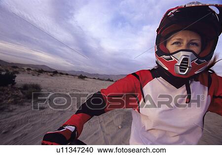 Woman in Racing Gear Riding Motorcycle View Large Photo Image Stock Image - Woman in Racing Gear Riding Motorcycle. Fotosearch