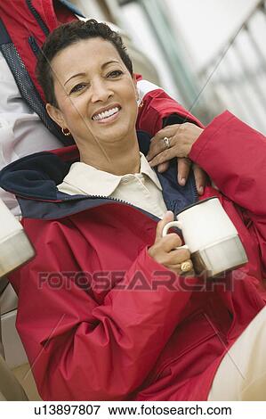 Woman relaxing on yacht, (portrait) View Large Photo Image Stock Photo - Woman relaxing on yacht, (portrait). Fotosearch