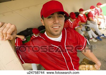 Young baseball player on field, (portrait) View Large Photo Image Picture - Young baseball player on field, (portrait). Fotosearch