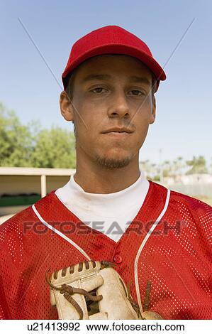 Young baseball player on field, (portrait) View Large Photo Image Stock Image - Young baseball player on field, (portrait). Fotosearch