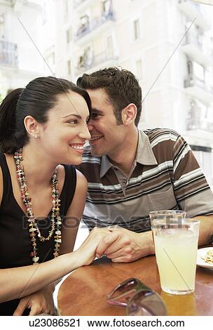 Young couple at cafe, portrait View Large Photo Image Stock Image - Young couple at cafe, portrait. Fotosearch