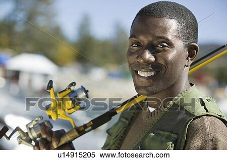 Young fisherman outdoors, (portrait) View Large Photo Image Stock Photography - Young fisherman outdoors, (portrait). Fotosearch