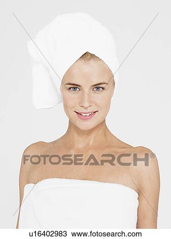 Young Woman with body and head Wrapped in Towels, portrait View Large Photo Image Stock Image - Young Woman with body and head Wrapped in Towels, portrait. Fotosearch