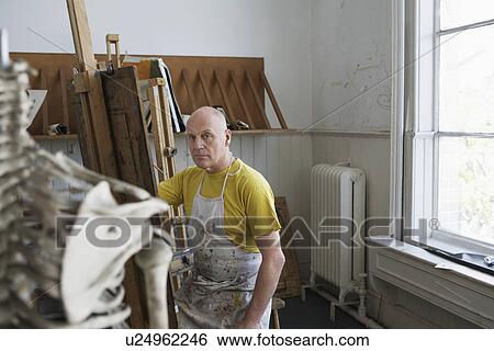 Artist drawing skeleton in studio View Large Photo Image Stock Photograph - Artist drawing skeleton in studio. Fotosearch