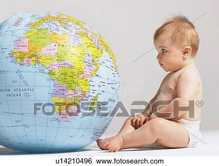 Stock Photograph - Baby and Globe. Fotosearch