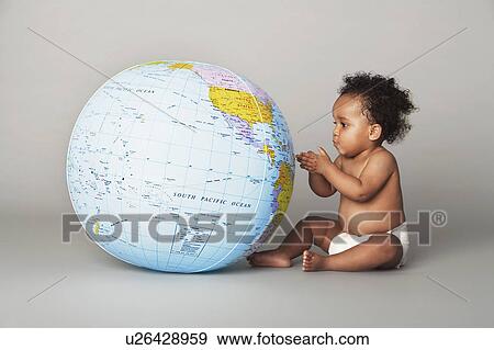 Baby Looking at Globe View Large Photo Image Stock Photo - Baby Looking at Globe. Fotosearch