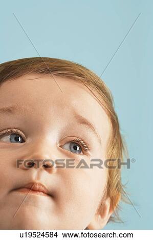 Baby looking away View Large Photo Image Picture - Baby looking away. Fotosearch