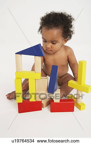 Baby Playing with Building Blocks View Large Photo Image Picture - Baby Playing with Building Blocks. Fotosearch