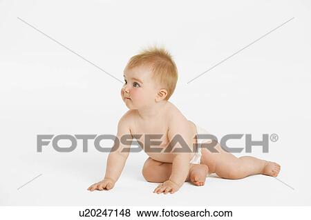 Stock Photo - Baby Sitting Up, looking to side. Fotosearch