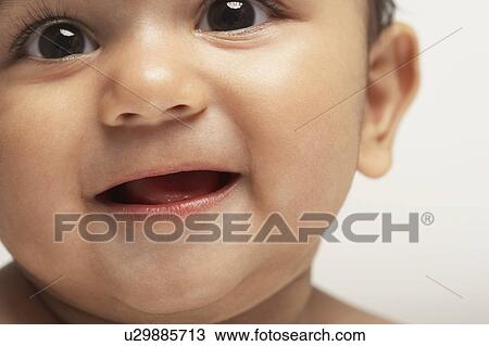Stock Image - Baby smiling. Fotosearch