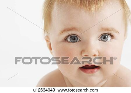Baby with fuzzy hair and open mouth View Large Photo Image Stock Photo - Baby with fuzzy hair and open mouth. Fotosearch