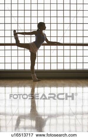 Stock Photo - Ballerina Practicing Move. Fotosearch