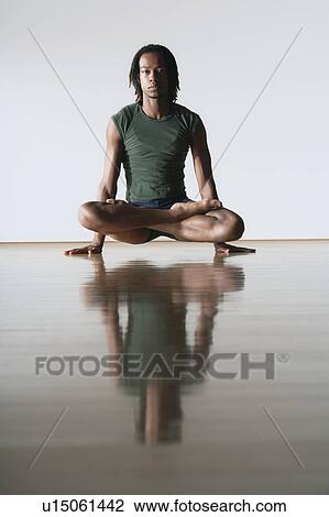 Ballet Dancer in lotus position View Large Photo Image Stock Image - Ballet Dancer in lotus position. Fotosearch