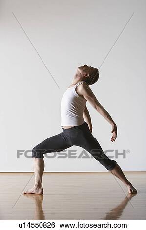 Ballet Dancer leaning backward View Large Photo Image Stock Photograph - Ballet Dancer leaning backward. Fotosearch