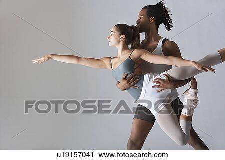 Ballet dancer supporting ballerina View Large Photo Image Stock Image - Ballet dancer supporting ballerina. Fotosearch