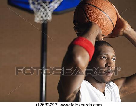 Basketball player preparing to throw ball, portrait View Large Photo Image Stock Image - Basketball player preparing to throw ball, portrait. Fotosearch