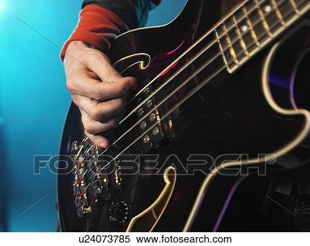 Bass Guitarist Performing View Large Photo Image Stock Photography - Bass Guitarist Performing. Fotosearch
