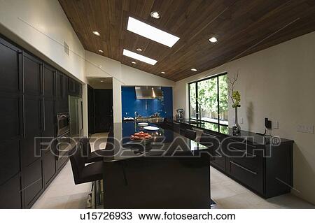 Stock Image - Black gloss kitchen with skylights. Fotosearch