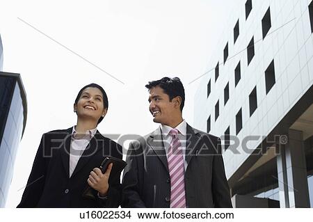 Business man cheering to city, back view View Large Photo Image Picture - Business man cheering to city, back view. Fotosearch