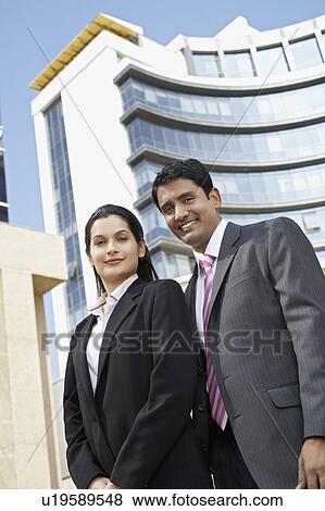 Stock Photo - Business man smiling outdoors. Fotosearch