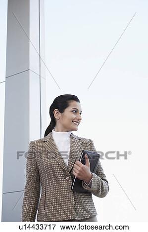 Stock Photo - Business woman looking away. Fotosearch