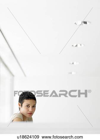 Stock Photo - Businesswoman in office, portrait. Fotosearch